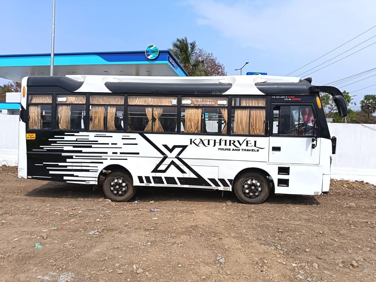 Kathir Tours and Travels coach, side view